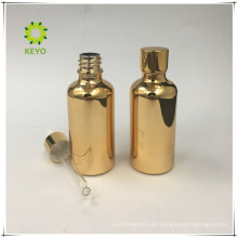 botella de perfume de vidrio 50 ml botella de aceite esencial de oro brillante botella de loción de vidrio redondo